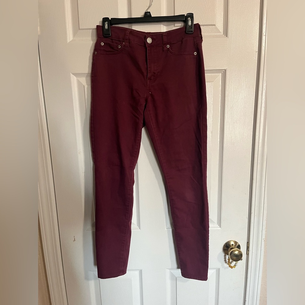 Burgundy skinny jeans